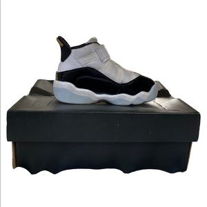 Nike Air Jordan 11s toddler size 5. White/ black/ gold